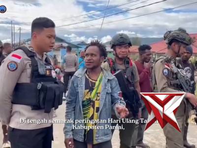 Kebersamaan Personel Ops Damai Cartenz-2025 dan Masyarakat di Tengah Meriahnya HUT Kabupaten Paniai - PoliceTube