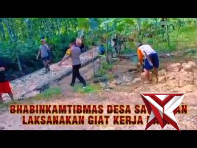 Kerja bakti Bhabinkamtibmas Polsek Ajibarang Polresta Banyumas membangun jalan menuju makam (TPU). - PoliceTube