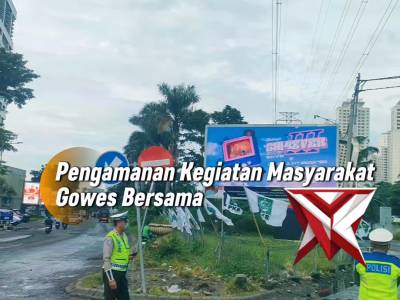 Polsek Dukuh Pakis Laksanakan Pengamanan Kegiatan Masyarakat Gowes Bersama - PoliceTube