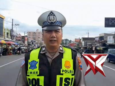 Pengaturan Arus Lalin dan Aiptu Iman Live Report pada titik kemacetan di Wilayah Polsek Lawang