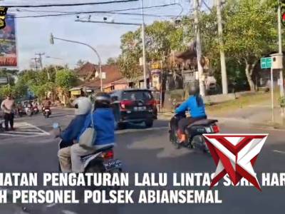 kegiatan pengaturan arus lalu lintas sore hari oleh personil polsek abiansemal - PoliceTube