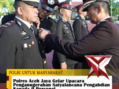 Polres Aceh Jaya Gelar Upacara Penganugerahan Satyalancana Pengabdian Kepada 9 Personel.