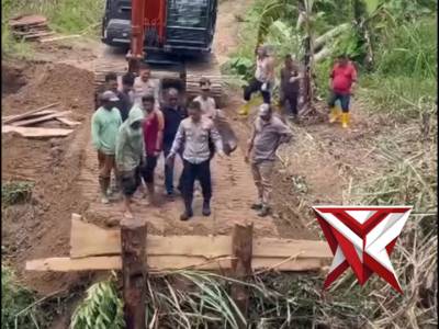 Bantuan Kapolres OKU Selatan Pembangunan jembatan way lumai Yang menghubungkan desa batu belang jaya