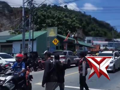 Pengaturan Lalu Lintas Polwan Anggrek Hitam Saat Sholat Jumat: Mengutamakan Keselamatan & Ketertiban