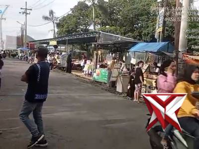 Patroli dialogis untuk "Menitipkan pesan-pesan kamtibmas Kepada Juru Parkir serta Penjual Takjil