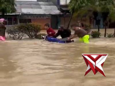 POLSEK SUNGGAL TANGGAP BENCANA BANJIR