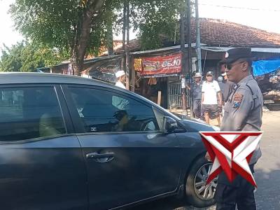 PENGATURAN ARUS LALU LINTAS DI SIMPANG TIGA PASAR HEWAN SAPI KEPPO GALIS PAMEKASAN