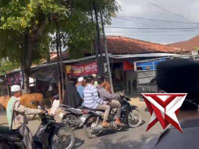 Pengaturan arus lalu lintas di simpang tiga pasar hewan sapi KEPPO