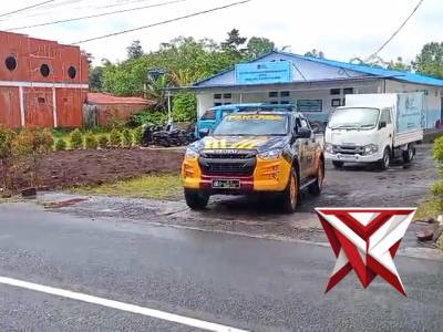 personel samapta polres tomohon melaksanakan giat pengawalan mobil MBG