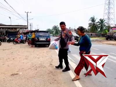 Aiptu E. R. Gultom membantu masyarakat yg memiliki keterbatasan fisik 17