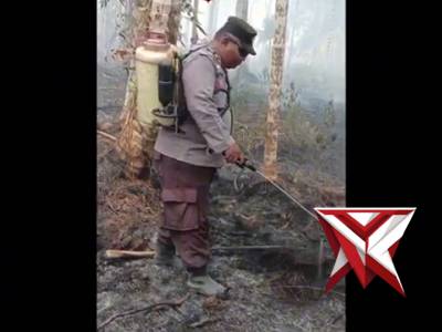 Pemadaman dan pendinginan titik Hotspot yang terpantau Satelit Aplikasi Lancang kuning di Polsek Gau