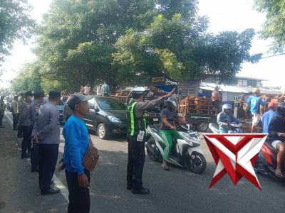 PENGATURAN ARUS LALU LINTAS DI SIMPANG TIGA PASAR HEWAN SAPI KEPPO