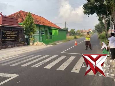 PENGATURAN ARUS LALU LINTAS DI DEPAN SEKOLAH MIN KONANG