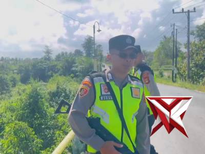 Personil Polsek Belitang I melaksanakan giat Mitigasi Bencana Alam