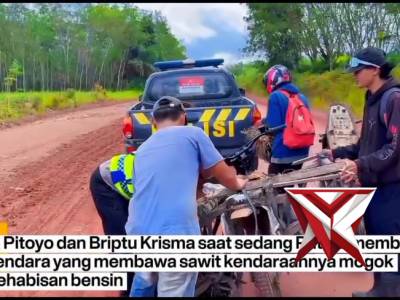 Aipda nPitoyo dan Briptu Krisma saat sedang melaksanakan Patroli diperbatasan melihat pengendara sep