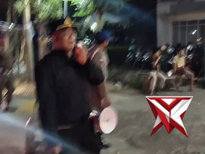 Satbinmas memberikan imbauan Kamtibmas  kepada seluruh penggembira saat pengesahan warga baru PSHT
