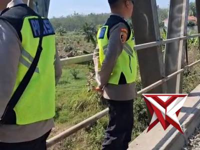 Personil Polsek Belitang I melaksanakan giat Mitigasi Bencana Alam